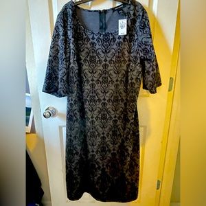 companion to your little black dress. Never worn with tags great pattern